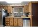 Traditional style kitchen with stainless steel appliances and updated double basin sink at 3160 E Main St # 110, Mesa, AZ 85213