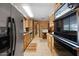 Modern kitchen features stainless steel appliances and ample counter space at 3160 E Main St # 110, Mesa, AZ 85213