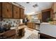 Functional kitchen offers a breakfast bar and stainless steel dishwasher at 3160 E Main St # 110, Mesa, AZ 85213