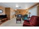 Comfortable living room featuring plush seating, light wood paneling, and open floor plan at 3160 E Main St # 110, Mesa, AZ 85213
