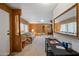 Bright living room features a large mirror and plenty of space for entertaining at 3160 E Main St # 110, Mesa, AZ 85213