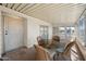 Enclosed patio features bright, natural light and comfortable seating for relaxing and entertaining at 3160 E Main St # 110, Mesa, AZ 85213