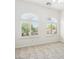 Bright bedroom with large windows and neutral carpet flooring at 3221 E Lynx Pl, Chandler, AZ 85249