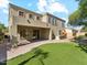 Exterior features a covered patio, built in grill, and artificial turf at 3221 E Lynx Pl, Chandler, AZ 85249