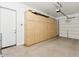 Attached garage with garage door opener and built in cabinets at 3221 E Lynx Pl, Chandler, AZ 85249