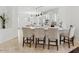 Bright kitchen features a large island with bar seating, stainless steel appliances, and white cabinets at 3221 E Lynx Pl, Chandler, AZ 85249