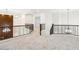 Spacious loft area with stylish railings and abundant natural light at 3221 E Lynx Pl, Chandler, AZ 85249