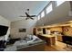 Open concept living room features lots of natural light, vaulted ceilings and wood floors at 3535 W Monte Cristo Ave # 129, Phoenix, AZ 85053