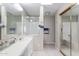 Spacious bathroom features a double sink vanity, lots of counterspace, and a glass-enclosed shower at 3755 E Broadway Rd # 36, Mesa, AZ 85206