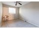 Bedroom featuring neutral colored carpet and walls, and a basket sitting on a decorative table at 3755 E Broadway Rd # 36, Mesa, AZ 85206