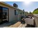 Cozy outdoor deck with seating and a relaxing atmosphere perfect for entertaining at 3755 E Broadway Rd # 36, Mesa, AZ 85206