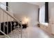 Cozy living room featuring wood-look floors, staircase and large window at 3755 E Broadway Rd # 36, Mesa, AZ 85206