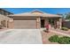 Charming single-Gathering home with a well-manicured lawn and a two-car garage at 3915 S 186Th Ln, Goodyear, AZ 85338