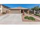 Charming single-story home featuring a tidy front yard, neutral color palette and a welcoming entrance at 3915 S 186Th Ln, Goodyear, AZ 85338
