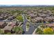 An aerial view of the community showcases the well-maintained streets and homes in a peaceful environment at 3932 E Melinda Dr, Phoenix, AZ 85050