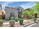 Charming two-story home with a landscaped front yard and inviting curb appeal, perfect for a Gathering at 3932 E Melinda Dr, Phoenix, AZ 85050