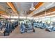 Well-equipped gym featuring modern cardio and weight machines under high ceilings and natural light at 3932 E Melinda Dr, Phoenix, AZ 85050