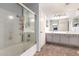 Bright bathroom with a shower-tub combo and double vanity at 4034 E Mine Shaft Rd, San Tan Valley, AZ 85143