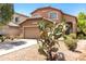 Charming two-story home with a low-maintenance desert landscape in a sunny neighborhood at 4034 E Mine Shaft Rd, San Tan Valley, AZ 85143