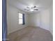 Bedroom featuring neutral paint, carpet flooring, and a ceiling fan at 41388 W Hopper Dr, Maricopa, AZ 85138