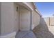View of the front entrance with a security screen door at 41388 W Hopper Dr, Maricopa, AZ 85138