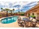 Beautiful pool and landscaped backyard with patio, perfect for relaxing and entertaining at 4245 E Yawepe St, Phoenix, AZ 85044