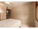 Light and airy bedroom with a ceiling fan and a bright neutral color palette at 4245 E Yawepe St, Phoenix, AZ 85044