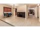 Open concept living area with dining room and wine storage, tile flooring at 4245 E Yawepe St, Phoenix, AZ 85044