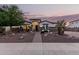 Charming single-story home featuring decorative rock landscaping and a brick walkway leading to the front door at 4282 N 180Th Dr, Goodyear, AZ 85395