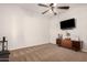 Neutral living room with dark furniture and flat screen TV at 4282 N 180Th Dr, Goodyear, AZ 85395