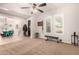 The room features neutral carpeting and a ceiling fan for added comfort at 4282 N 180Th Dr, Goodyear, AZ 85395