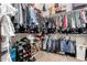 Organized walk-in closet with hanging racks, shelving, and shoe storage maximizing space and functionality at 4282 N 180Th Dr, Goodyear, AZ 85395