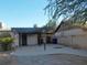 View of a patio area with wood pergola in the backyard at 430 W Santa Cruz Dr, Tempe, AZ 85282