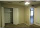 Bedroom with closet, carpet and a view to another room at 430 W Santa Cruz Dr, Tempe, AZ 85282