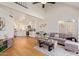 Open-concept living room and kitchen boasting bright, airy spaces and modern finishes at 4317 W Orangewood Ave, Glendale, AZ 85301