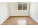Bright, empty bedroom with wood floors offers a versatile space at 4626 E Villa Rita Dr, Phoenix, AZ 85032