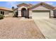 Charming single-story home with a two-car garage, low maintenance landscaping, and a classic Southwestern design at 4626 E Villa Rita Dr, Phoenix, AZ 85032