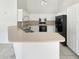 Well-lit kitchen with plenty of cabinet space and modern appliances at 4626 E Villa Rita Dr, Phoenix, AZ 85032