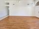 Bright, open living room with wood floors and neutral walls, perfect for entertaining at 4626 E Villa Rita Dr, Phoenix, AZ 85032