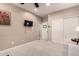 Neutral bedroom with carpet, mounted TV, closet and neutral walls, ideal for relaxation at 4706 E Des Moines St, Mesa, AZ 85205