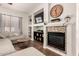 Inviting living space with stylish fireplace, creating a warm and welcoming atmosphere at 4706 E Des Moines St, Mesa, AZ 85205