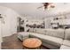 Spacious living room featuring tile floors, modern decor, and an open layout, perfect for entertaining at 4706 E Des Moines St, Mesa, AZ 85205