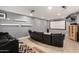 Finished basement featuring a home theatre, projector, and plush seating, for the ultimate movie experience at 4706 E Des Moines St, Mesa, AZ 85205