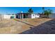 Large backyard with patio and block fencing at 4750 N 50Th Ave, Phoenix, AZ 85031