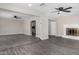 Spacious living room features wood-look floors and is open to the dining and Gathering areas at 4750 N 50Th Ave, Phoenix, AZ 85031