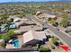 Aerial real estate view of single Gathering house with inground pool, desert landscaping, and tile roof at 5049 E Duane Ln, Cave Creek, AZ 85331