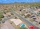 Aerial view of a residential neighborhood featuring a private pool and desert landscaping at 5049 E Duane Ln, Cave Creek, AZ 85331