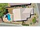 Real estate aerial view of home highlighting the pool, covered patio, and well maintained landscaping at 5049 E Duane Ln, Cave Creek, AZ 85331