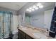 Bathroom with double sink vanity and shower/tub combo at 5049 E Duane Ln, Cave Creek, AZ 85331
