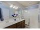 Bright bathroom with double sinks, spacious vanity, and glass door shower at 5049 E Duane Ln, Cave Creek, AZ 85331